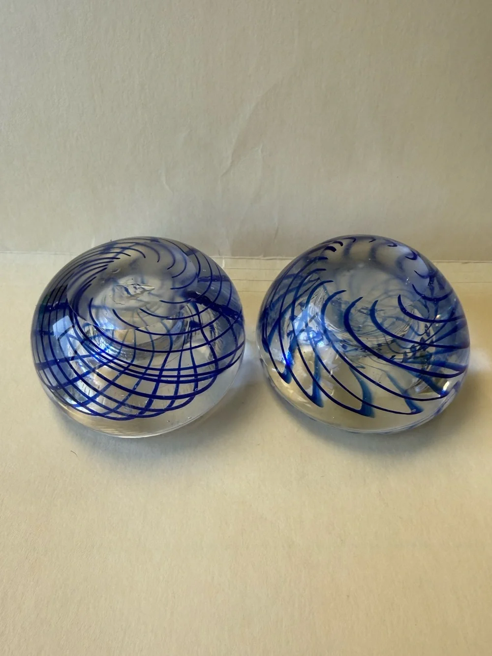 Pair of Handmade Art Glass Paperweight Candle Holders. Clear with Blue Swirl.